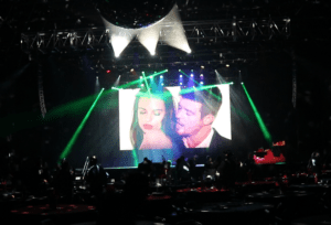 Large video screen at the Bomb Factory showing Robin Thicke and Emily Ratajkowski in the “Blurred Lines” music video during a live video DJ performance.