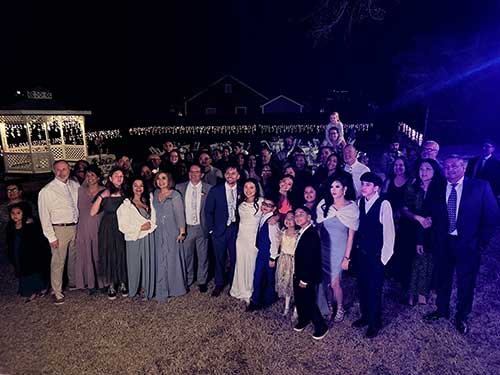 Latino family gathered at an elegant Dallas-Fort Worth wedding reception